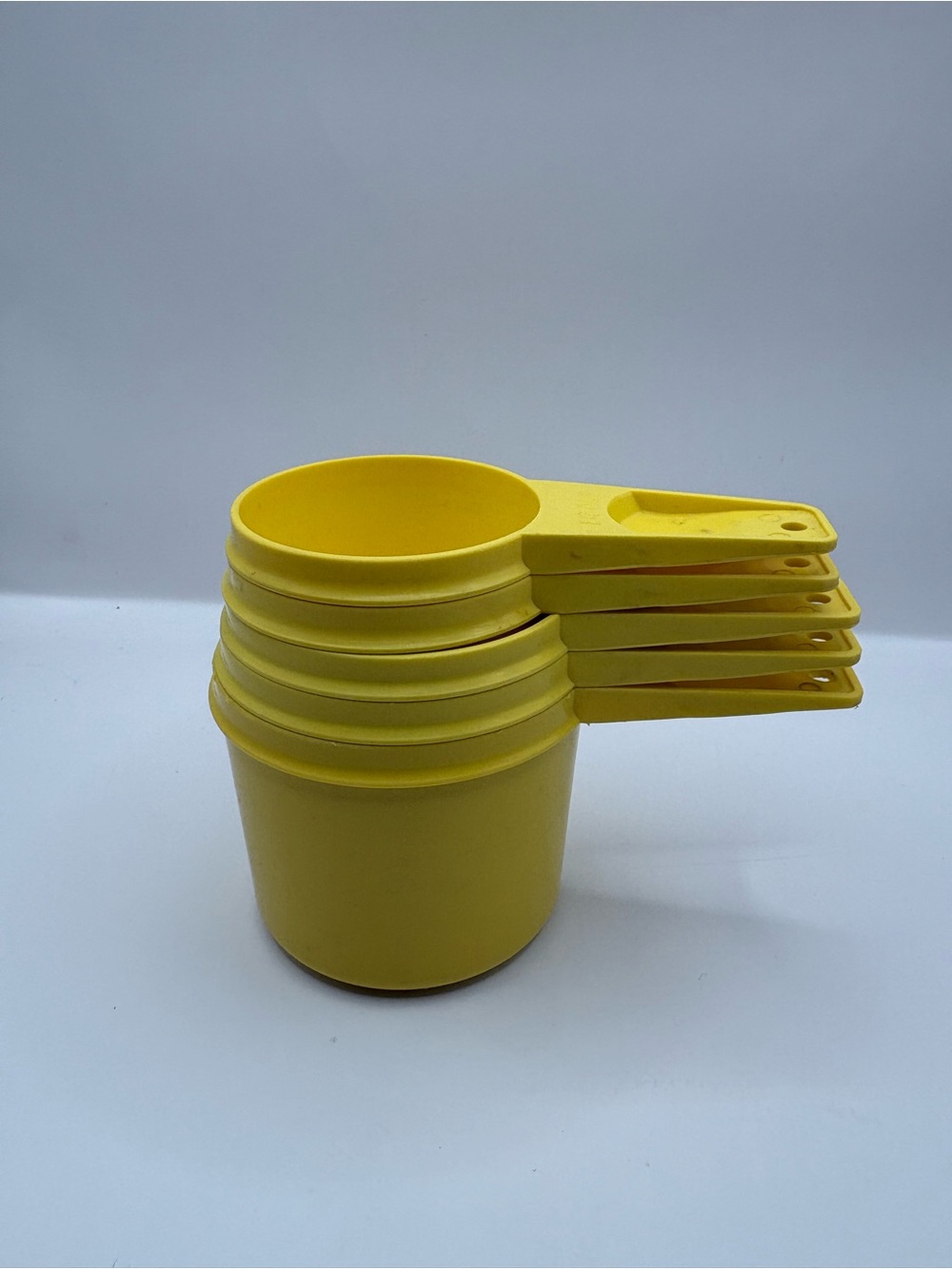 Tupperware Yellow Nesting Measuring Cups - Set of 5